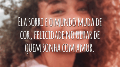 Ela sorri e o mundo muda de cor, felicidade no olhar de quem sonha com amor.
